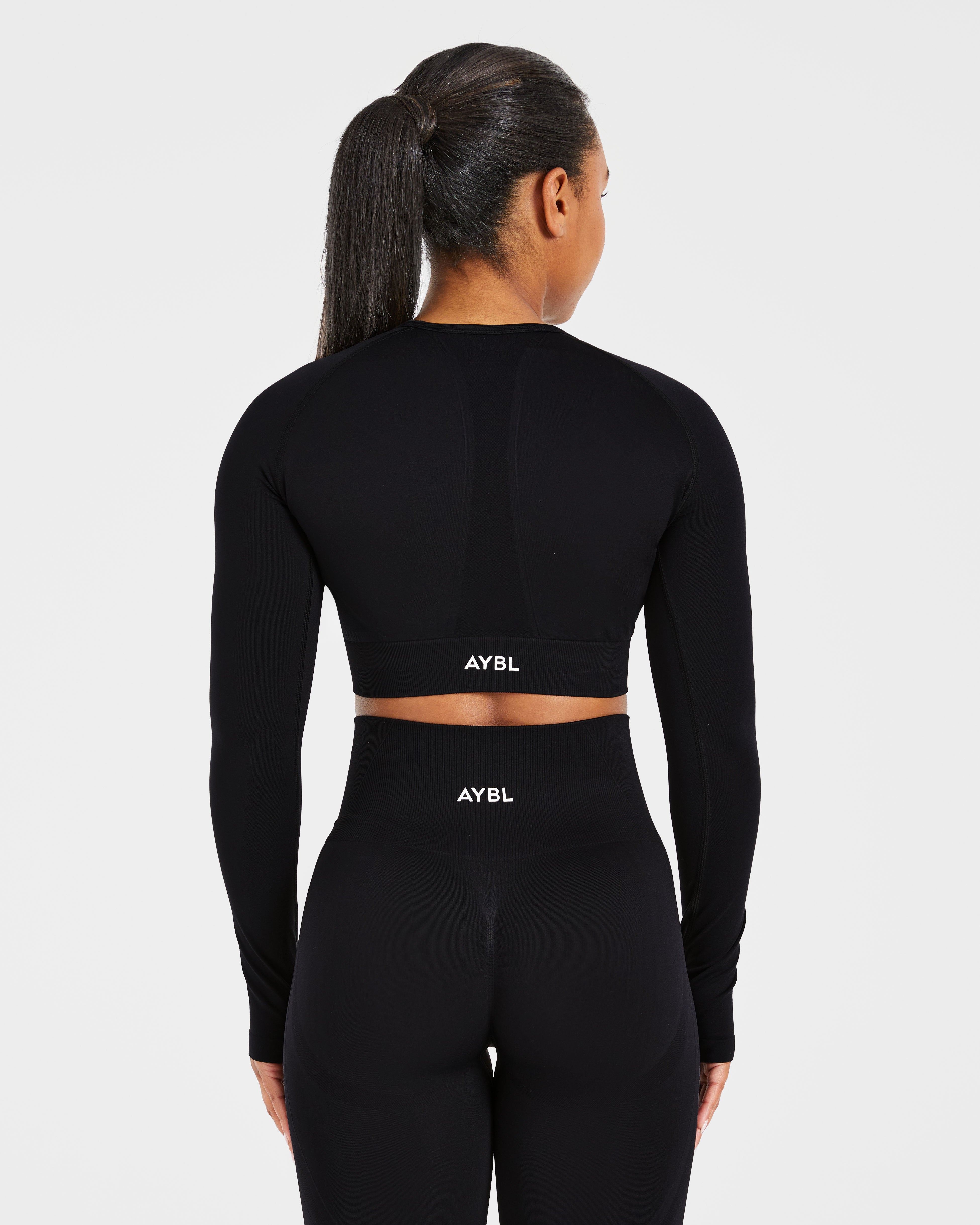 Top Crop Senza Cuciture con Maniche Lunghe Empower - Nero