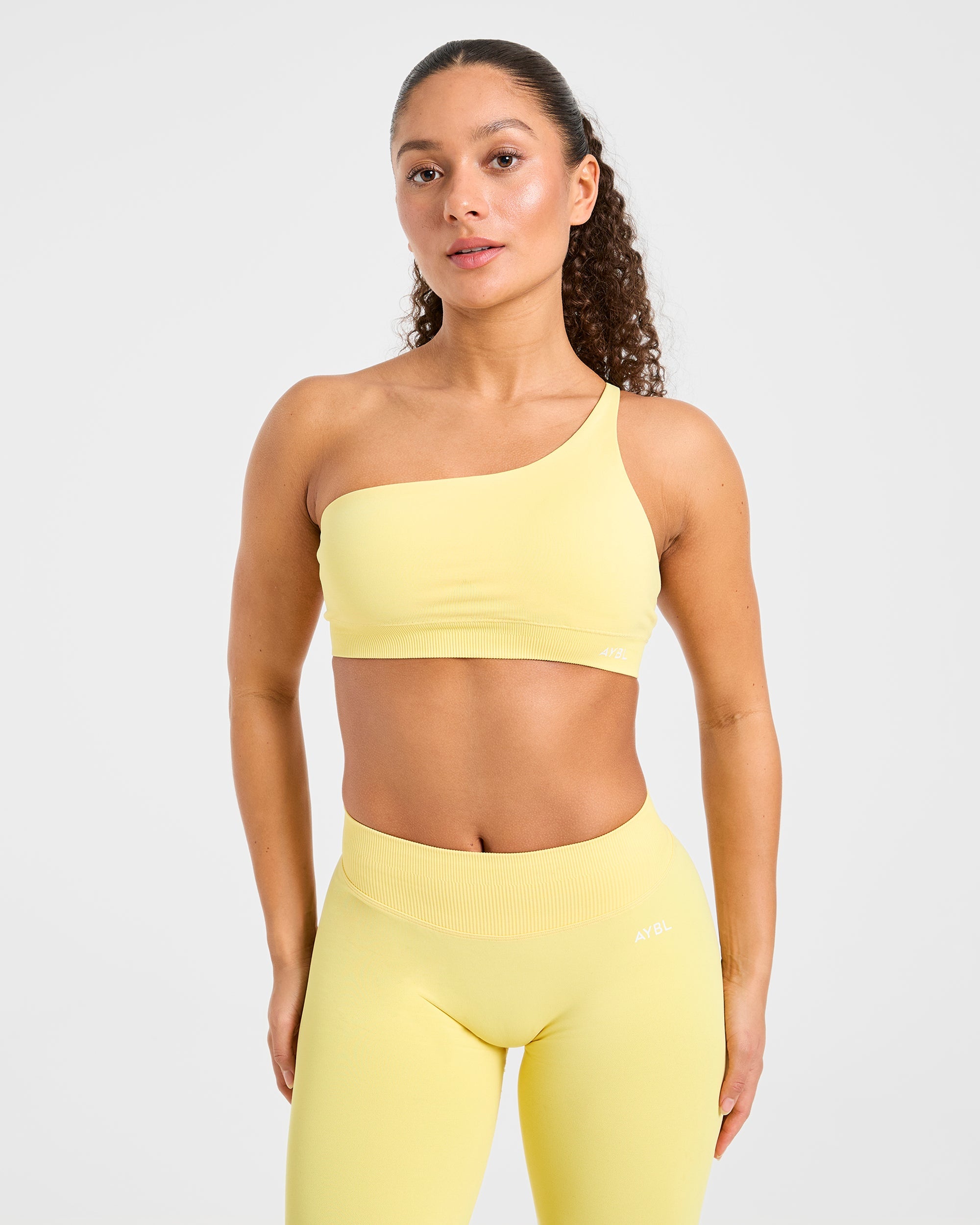 Aumenta il tuo look con lo Sports Bra monospalla senza cuciture - Giallo acceso
