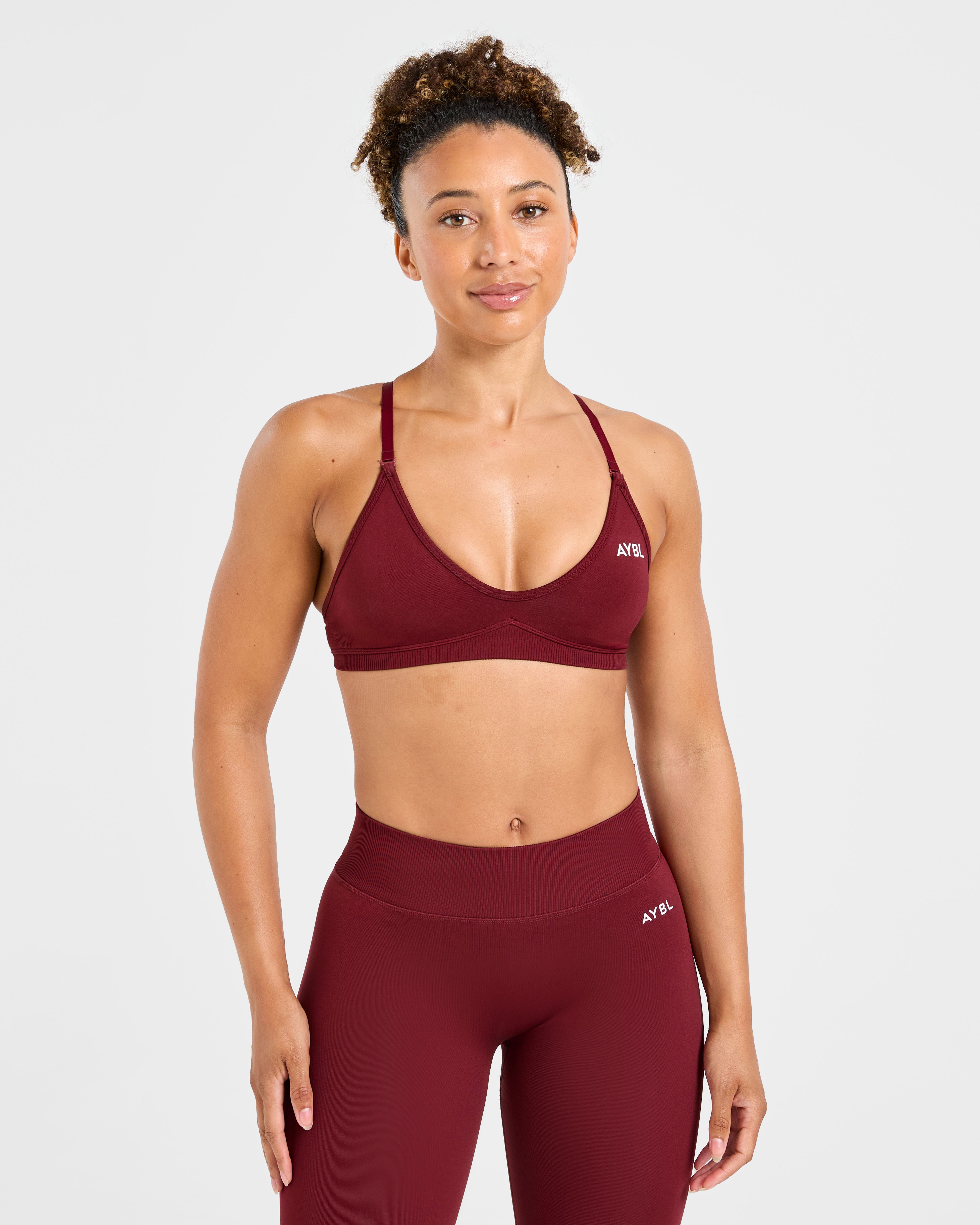 Sports Bra Senza Sostegno con Cinghie Intrecciate Adapt - Rosso Autunnale