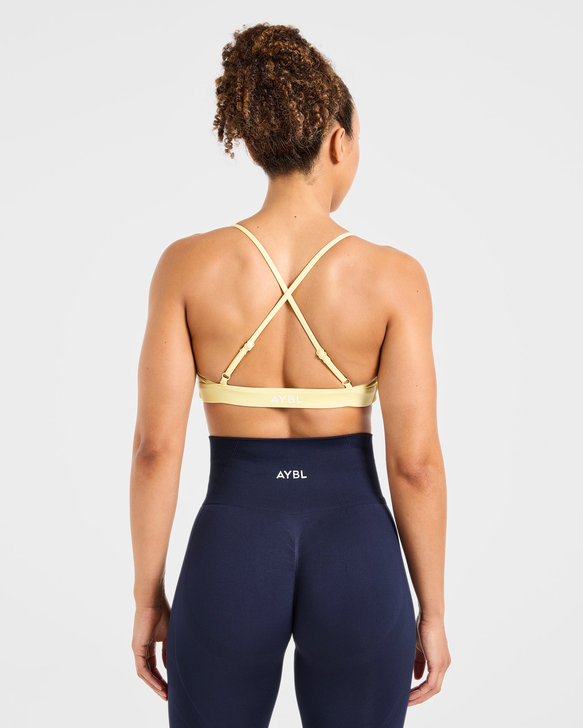Sports Bra Essential Twist a Spalle Crociati - Giallo