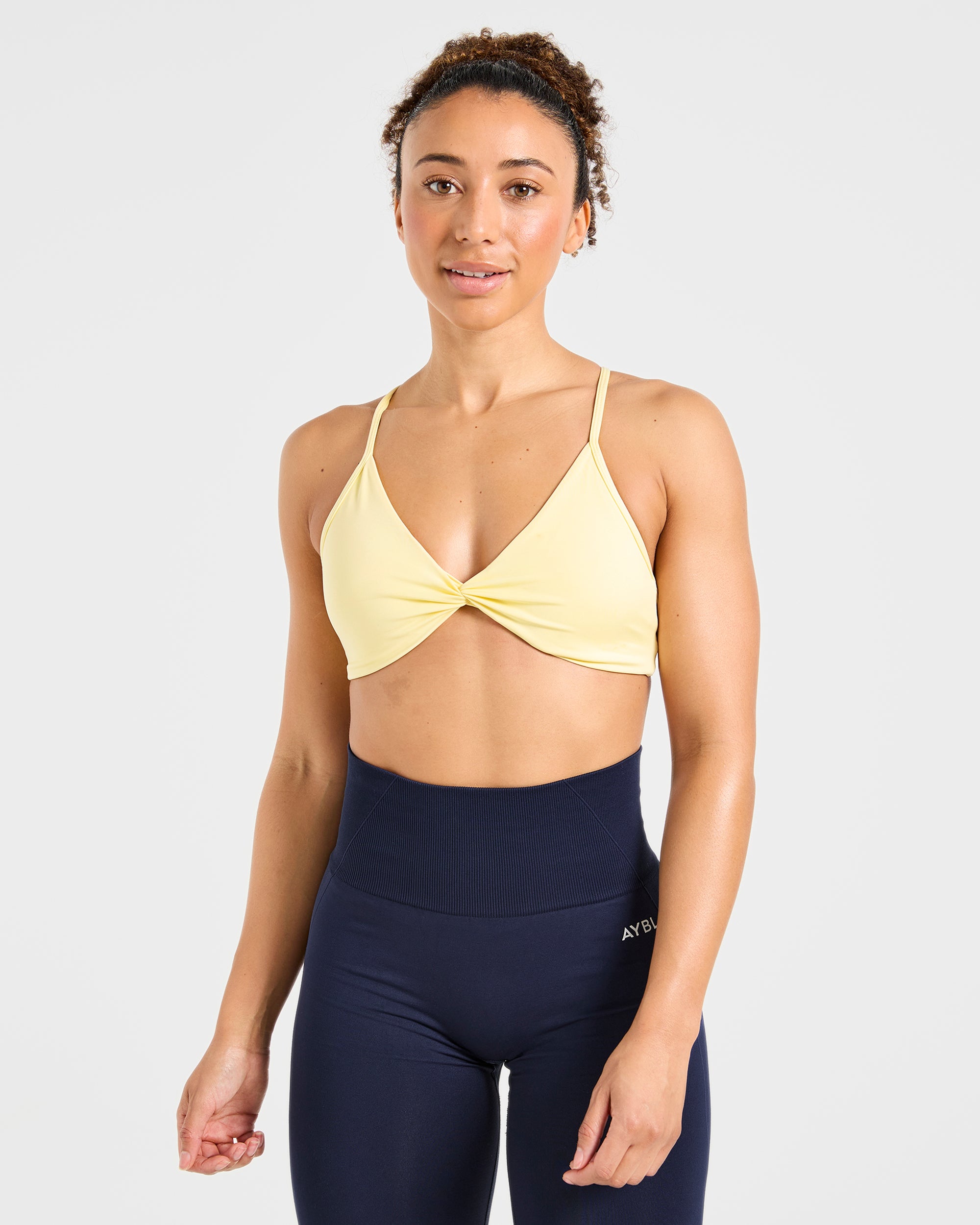 Sports Bra Essential Twist a Spalle Crociati - Giallo